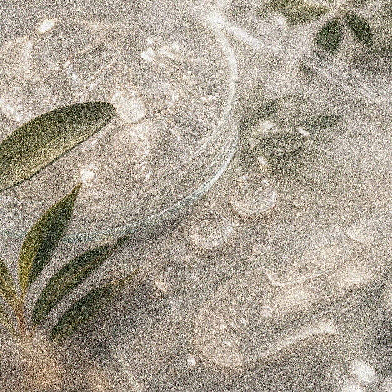 NEVARI Hydroxy Acid Resurfacer grainy scientific ingredient editorial image