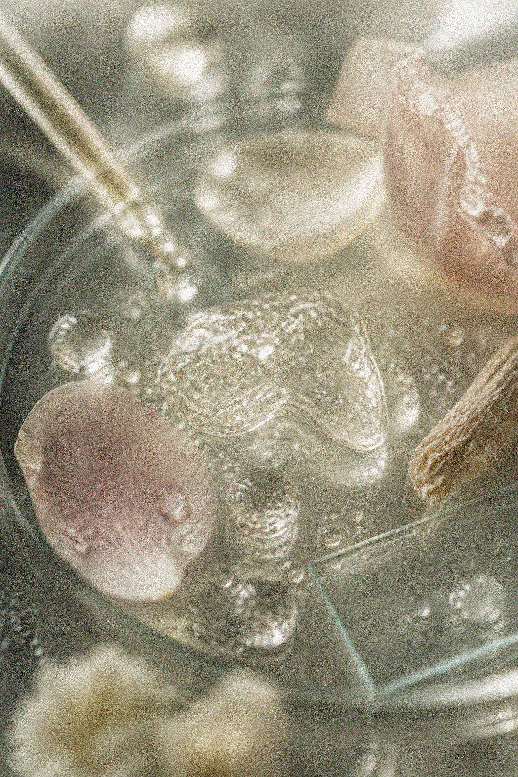 NEVARI Hyaluronate Prep grainy scientific ingredient editorial image
